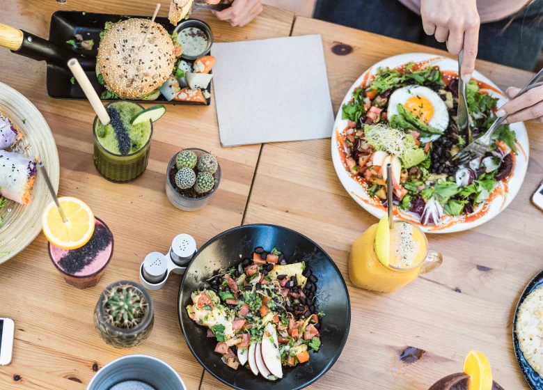 Healthy brunch with salads and smoothies